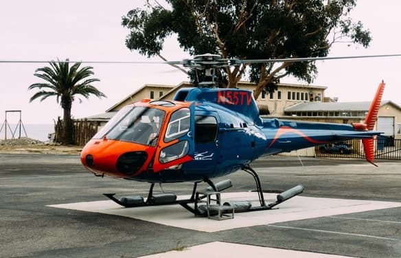 VUELO EN HELICOPTERO Y BARCO CATAMARÁN